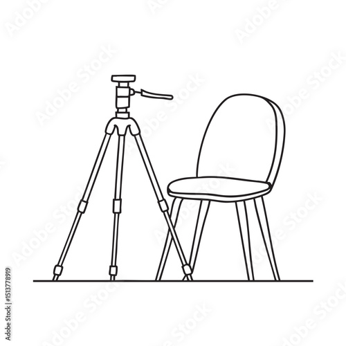 A tripod leaning on a chair