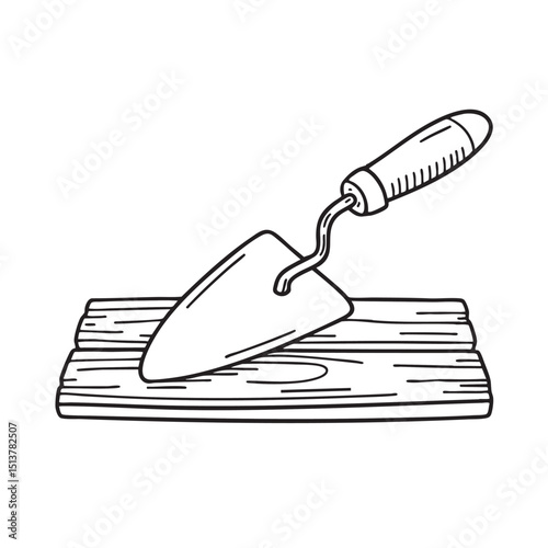 A wooden plank with a trowel on top
