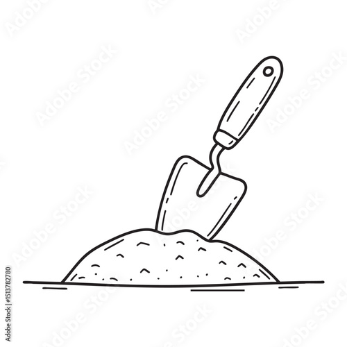 A garden soil with a trowel embedded in it