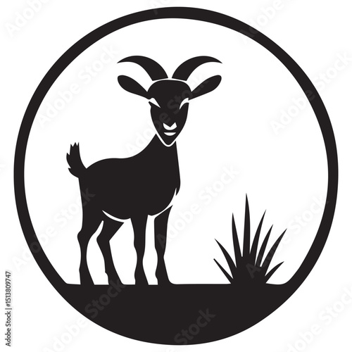 A black goat stands in a circle with grass at its feet