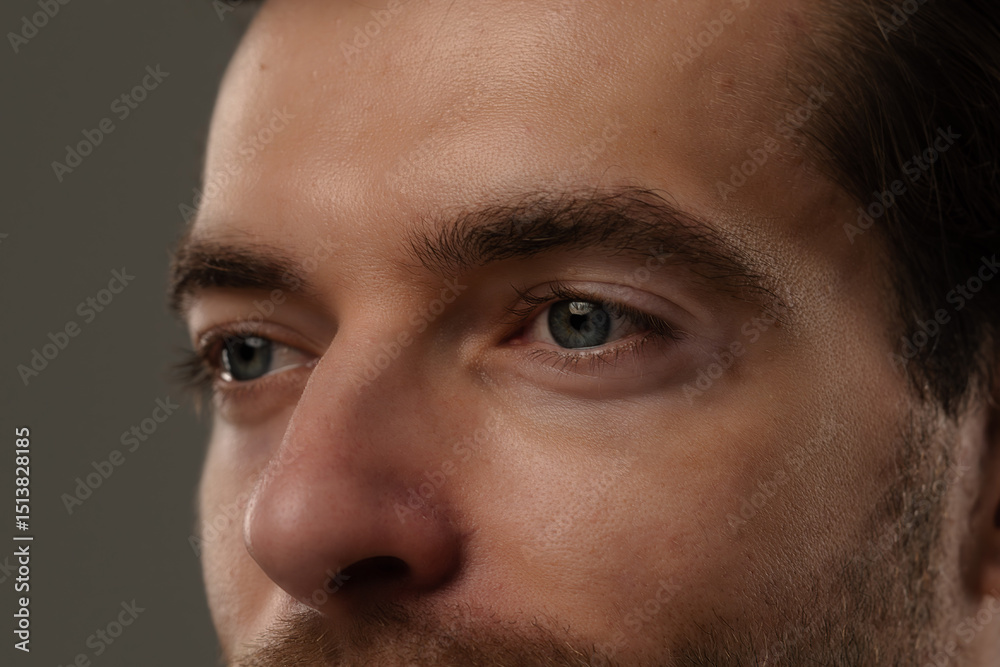 Fototapeta premium Portrait of a Man with Short Hair and Earrings