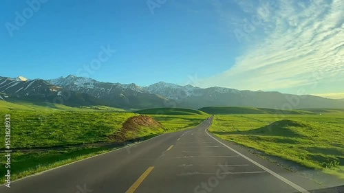 Rice Fields in the Hills
Description: Vibrant green rice terraces on rolling hills under a clear sky.