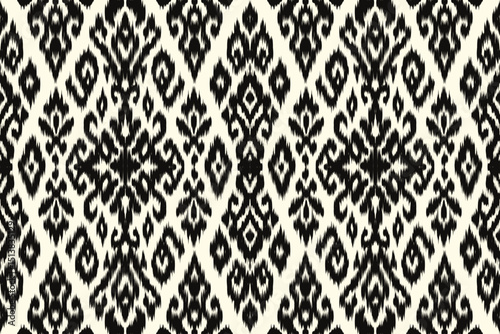 Traditional black and white ikat seamless pattern, ethnic textile design background with handwoven style. Boho tribal ornament for fabric, wallpaper, fashion, and surface decoration.