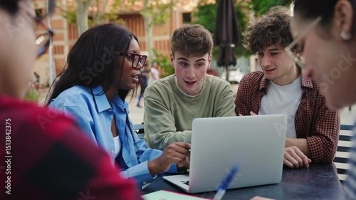 Happy university students team learning and working together, studying for exams at college campus