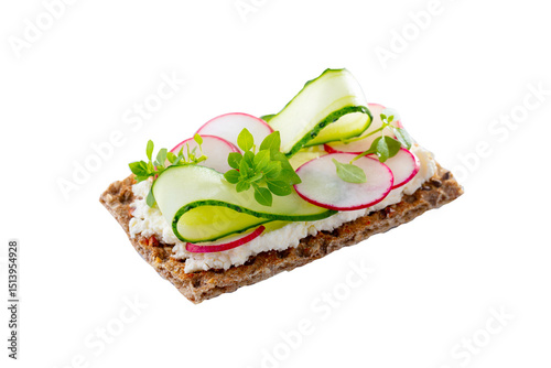 Healthy crispbread. Toast, sandwich, toast with cream cheese, cucumber, radish and fresh basil leaf. Isolated on white background. Close up.
