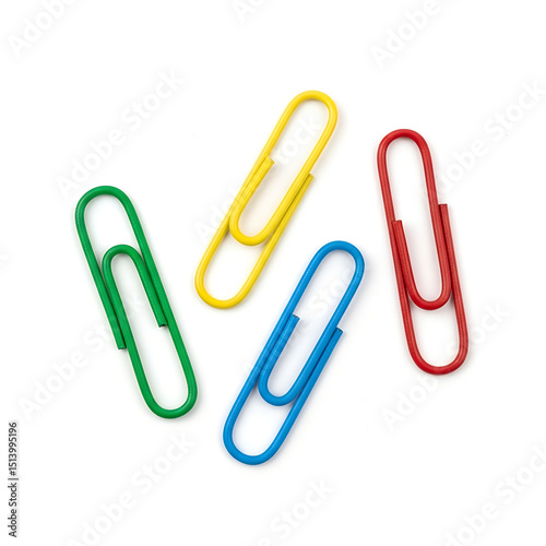 Colorful paperclips in various colors arranged on a white background  