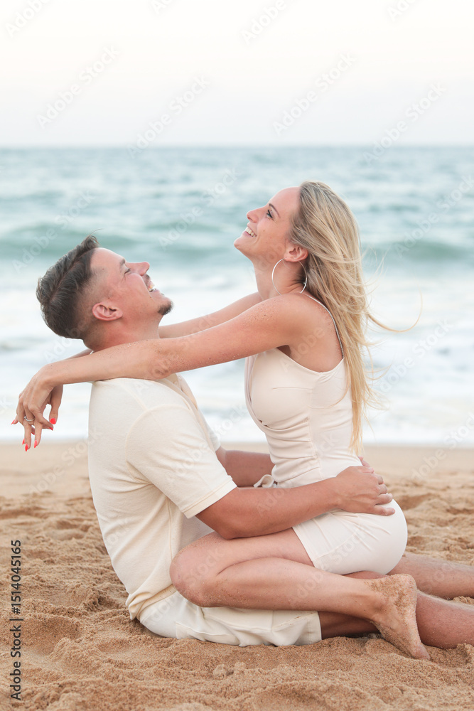 Young happy traditional couple in love in summer at sea on the beach. Love. Family. Young happy traditional couple in love in summer at sea on the beach. Love. Family.