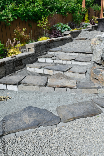 Landscape garden pathway hardscape project in progress for yard landscaping and flowerbeds