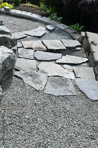 Landscape garden pathway hardscape project in progress for yard landscaping and flowerbeds