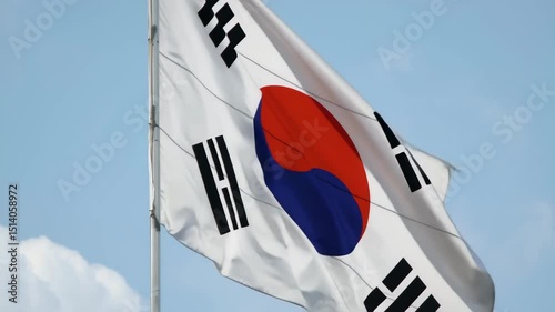 Republic of Korea Flag Waving Against Blue Sky