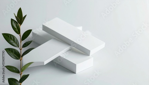 Green Branch with White Geometric Forms