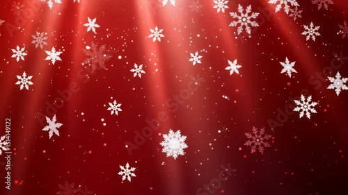 Snowflakes gently fall in a festive red atmosphere, creating a magical winter scene with radiant beams of light, and adding a touch of elegance and holiday spirit to any setting.