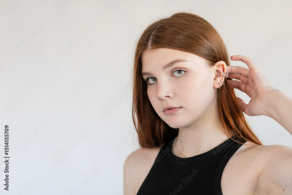 Portrait red-haired girl with freckles and braces Portrait red-haired girl with freckles and braces