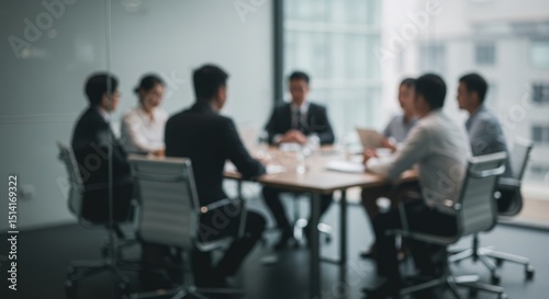Blurred Photo of Corporate Team Meeting at Office Table Discussion