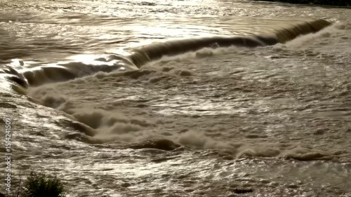 River Water Flowing Over Dam Structure Fast Moving Waterscape