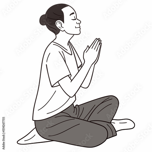 Woman meditating in a peaceful yoga pose hands clasped together