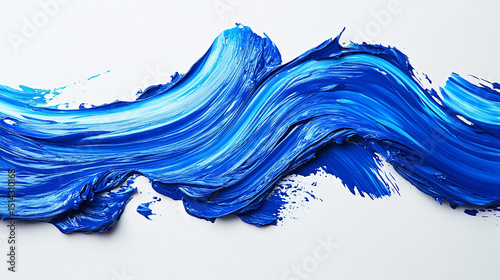 A bold stroke of ultramarine acrylic paint evokes the feeling of ocean waves and artistic expression over canvas in