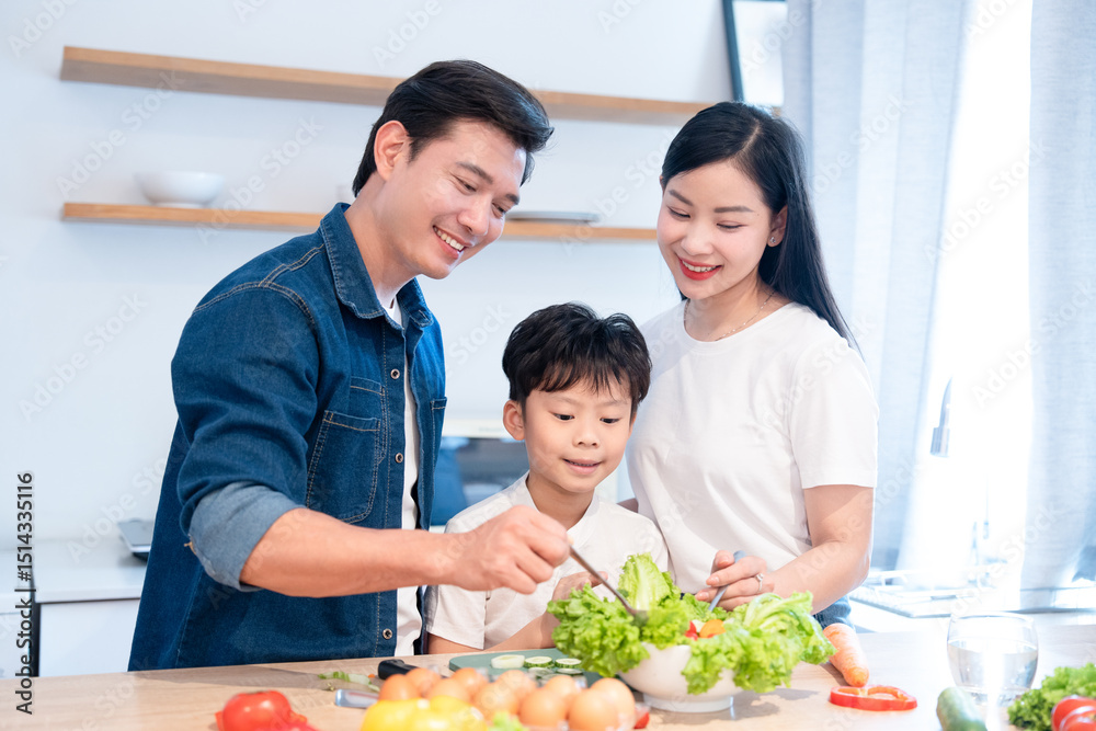 Naklejka premium Family prepares a fresh colorful salad in their kitchen embracing healthy eating together