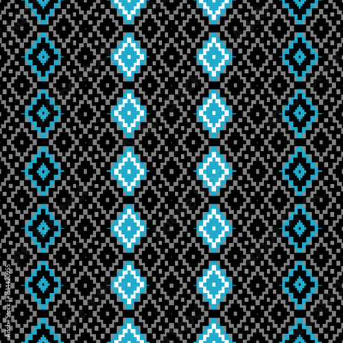 A pixel-style tribal seamless pattern with blue, black, and gray diamond shapes. Ideal for bold textile prints, digital designs, and ethnic-themed projects.