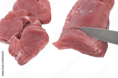 The cook prepares meat for steaks, meat portioning, red meat isolated on a white background