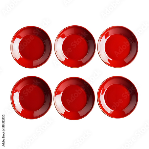 Arrangement of six glossy red plates isolated on a black background top view