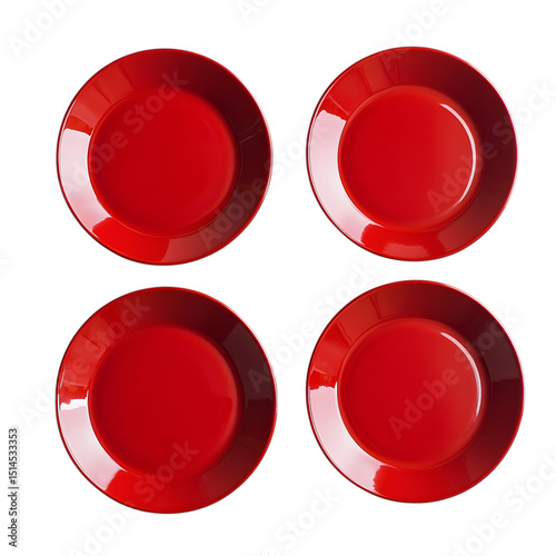 Four shiny red plates arranged on a symmetrical black background for a food related theme