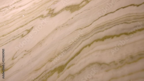 Close up shots of a white and green marble floor pattern.
