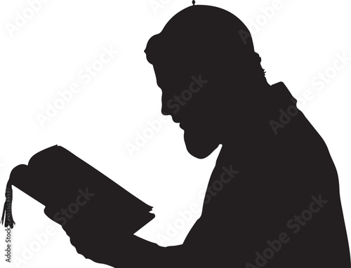 Silhouette of Muslim Man Reading Holy Book