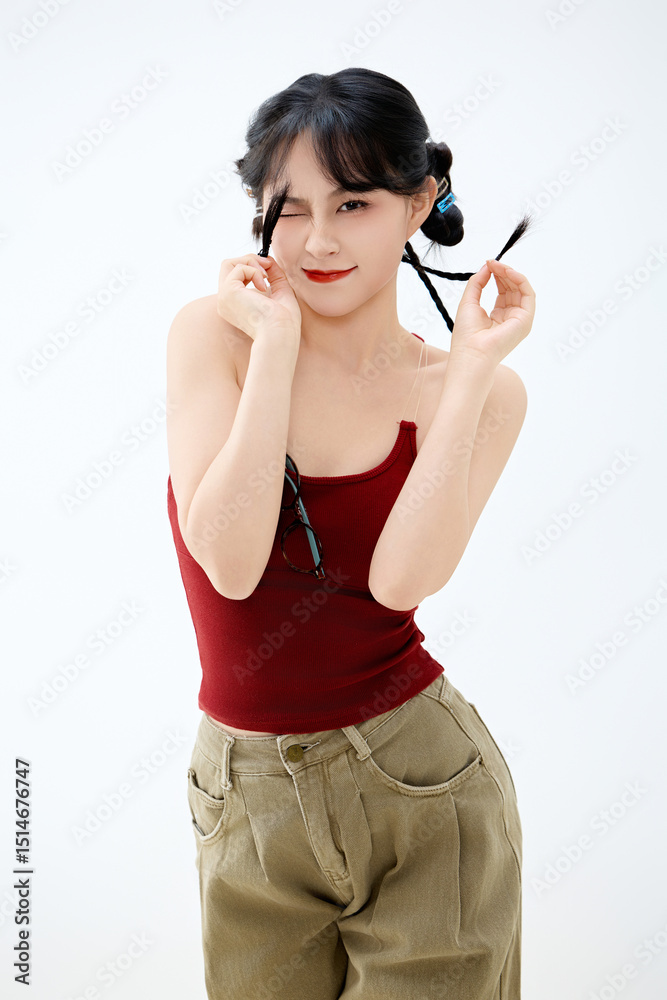 Studio shot of young and beautiful Asian woman in summer outfit Studio shot of young and beautiful Asian woman in summer outfit