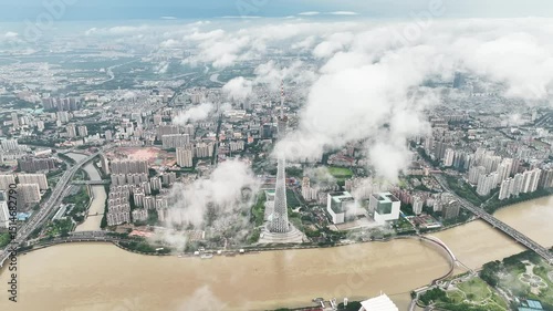 Guangzhou tower and cityscape viewed through clouds in china