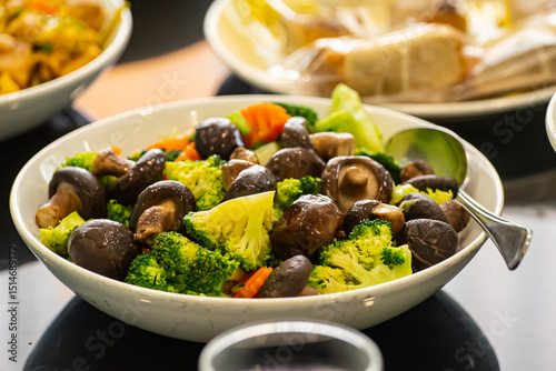 broccoli cooked shiitake mushrooms / stir fried shrimp broccoli vegetable with oyster sauce mushrooms on white plate