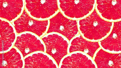 Abstract Grapefruit Slices Rotating Seamless Animation On Yellow Background 4k