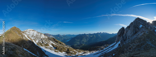 large panorama towards Altdorf in Switzerland in the Alps in spring with beautiful weather and blue sky