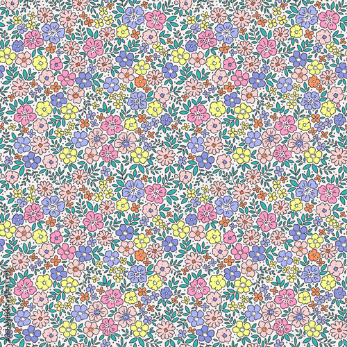 Liberty seamless floral pattern. Ditsy style background of small pastel flowers. Small blooming daisy flowers scattered over a white background. Stock vector for printing on surfaces and web design.
