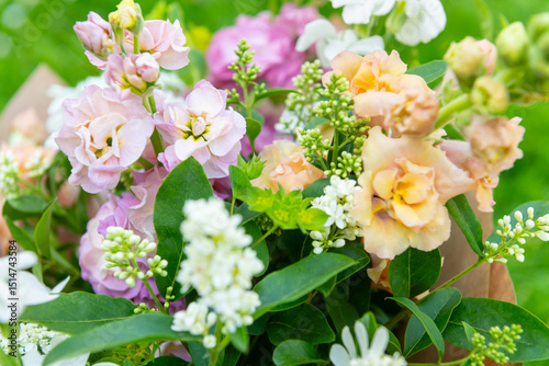 Bouquet made of mixed spring flowers. Beautiful pastel colored fresh flowers arrangement. Birthday bouquet with snapdragons and matthiola stock.