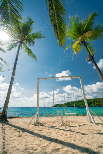Fototapeta Naklejka Na Ścianę i Meble -  Beautiful tropical beach at exotic island with palm trees