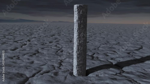 Lonely stone pillar standing in cracked barren desert under dramatic twilight sky
