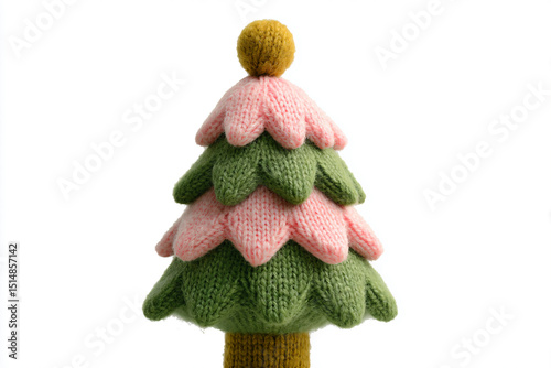 a knitted christmas tree with a pink and green top