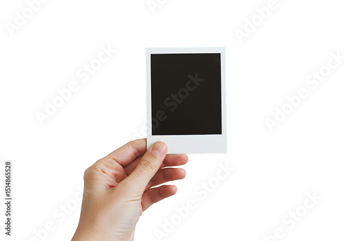 A hand holds a polaroid blank picture, isolated on white or transparent background. PNG