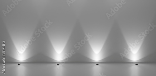 Series of spotlights from the floor in white room against wall, empty room background template