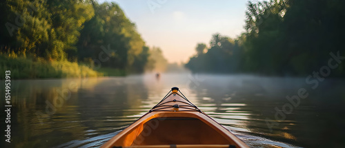 Sunrise Kayaking On A Misty River Through Forest