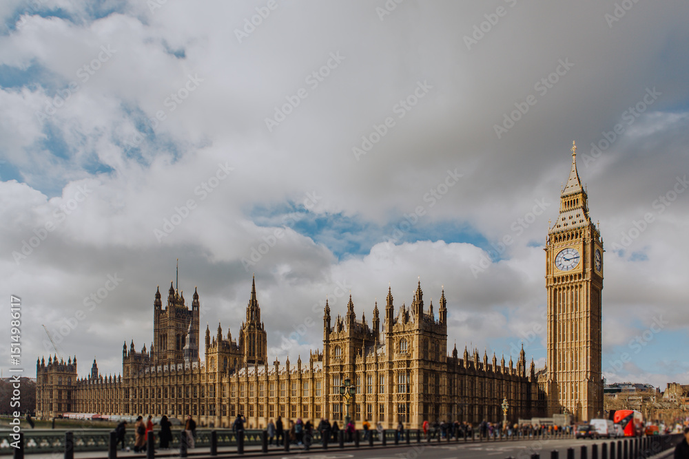 Obraz premium The majestic Palace of Westminster, home to the UK Parliament, stands as a symbol of British democracy. Its iconic Gothic Revival architecture dominates the London skyline