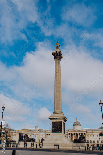 Photos London's iconic Trafalgar Square is captured with its towering Nelson's Column monument, a central landmark surrounded by grand architecture and the vibrant energy of the city