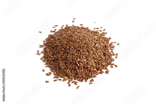 A small pile of flax seeds lies on a white background.
