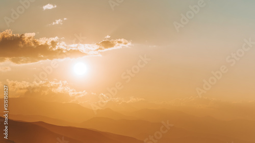 Majestic sunset casting warm golden light over a mountain landscape, creating a serene and breathtaking scene