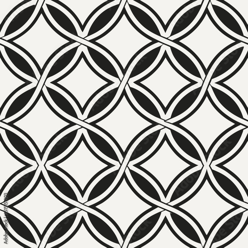 Seamless black and white geometric pattern with interlocking circular and diamond shapes in a bold modern design
