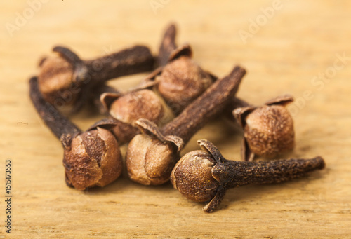 Fototapeta Naklejka Na Ścianę i Meble -  Clove spice on wooden background.