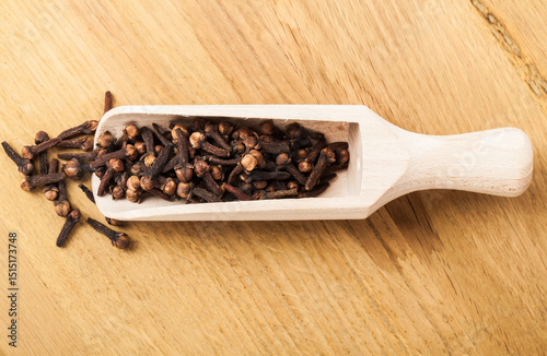 Fototapeta Naklejka Na Ścianę i Meble -  Clove spice on wooden background.