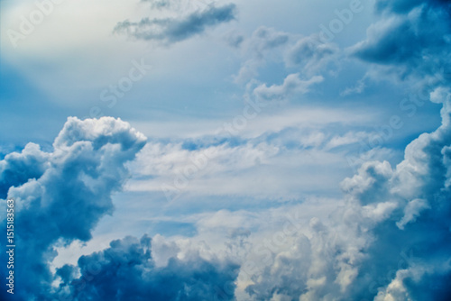 An intentionally soft-focus image of a dramatic sky with evocative clouds, designed as a subtle backdrop for creatives—allowing foreground elements in web or media projects to take center stage