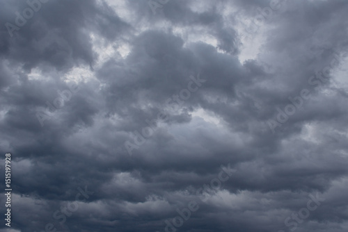 Fototapeta Naklejka Na Ścianę i Meble -  Central Kazakhstan. View of the gloomy dramatic sunset sky with dark clouds.